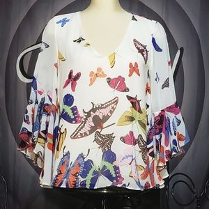 Butterfly print blouse.